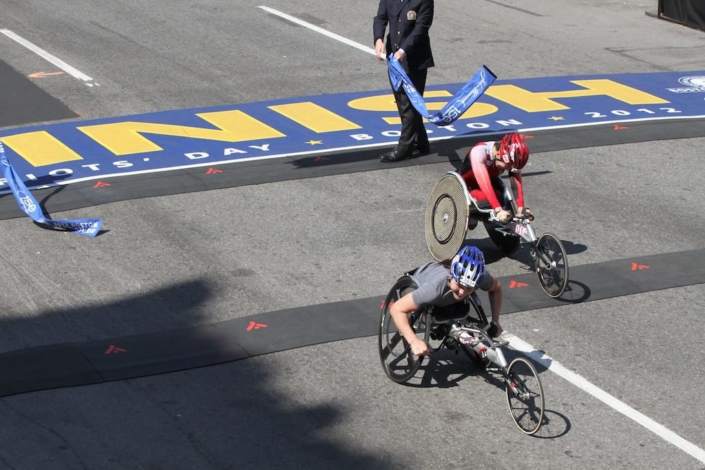 Apr.16, 2012-The first wheerchair winner Shirley Reilly from USA crosses the finish line one second before the second winner Wakako Tsuchida from Japan at 116th Boston Marathon. First winner: 1:37:36/ Second winner: 1:37:37 (Hyunah Jang / Boston University News Service)
